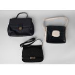 A Gucci black leather and monogram fabric saddlebag style shoulder bag,