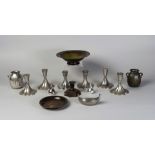 A set of six Danish Just Andersen pewter candlesticks, factory marks for to base, model 1164,