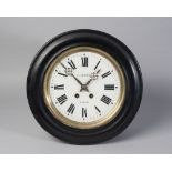 A French circular wall clock, late 19th century, with an ebonised case,