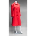 An Aquascutum orange wool coat, with small collar and gilt buttons,