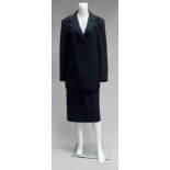 A Hermes black wool long line jacket and skirt suit,