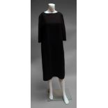 A Louis Vuitton black wool dress, round neck and three-quarter length sleeves,