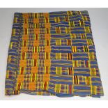 A Kente cloth, South Ghana, finely woven with rectangles of striped design in yellow,