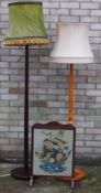 Two standard lamps and a fire screen