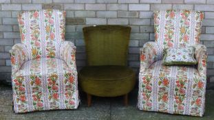 A pair of upholstered tub chairs and another