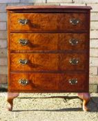 A small walnut bow front chest of drawers