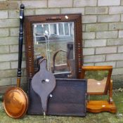 An oak framed mirror,