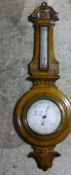 A Victorian oak barometer