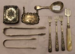 A quantity of small silver items, including decanter labels,