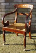 A 19th century mahogany open armchair