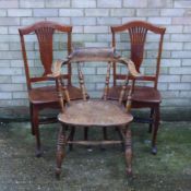 A smokers bow armchair and a pair of oak chairs