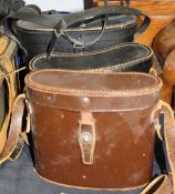 A Ross of London cased pair of binoculars and two others