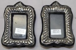 A pair of small silver frames