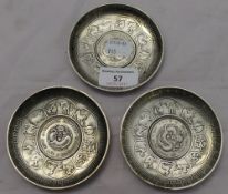 A set of three Chinese coin dishes