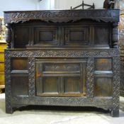 A 17th/18th century oak court cupboard