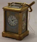 A Sevres style miniature carriage clock