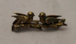 A 15 ct gold double bird brooch