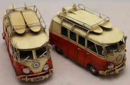 A pair of Volkswagen camper vans