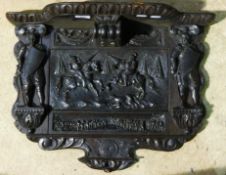 A 19th century carved oak panel