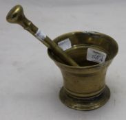 A 19th century bronze pestle and mortar