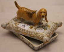 A porcelain box surmounted with a dog