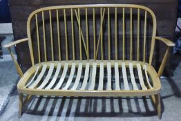 A blonde Ercol settee