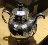 A silver plated self-pour teapot,