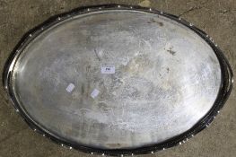 A large silver plated tray