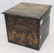 A Victorian chinoiserie lacquered tea caddy