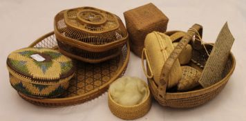 A quantity of small woven baskets etc