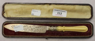 A cased ivory handled silver cake knife
