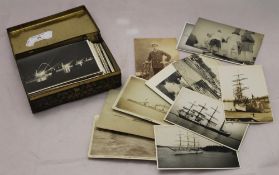 A quantity of shipping related postcards and photographs