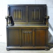 An early 20th century monks bench