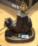 A carved Blackforest bear form table lamp