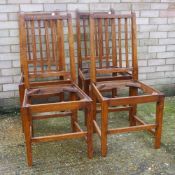 A set of four oak dining chairs