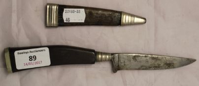 An ebony handled dagger