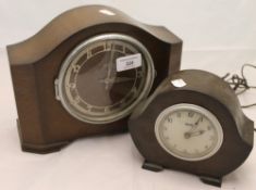 Two electric clocks and a dressing table set