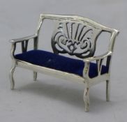 A miniature silver chair
