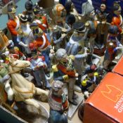 A quantity of porcelain and other model soldiers