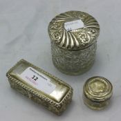 Three silver top toilet jars