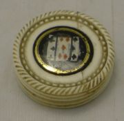 A 19th century ivory games chip holder