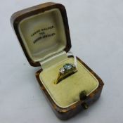 An 18 ct gold and platinum three stone ring