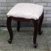 A modern upholstered stool