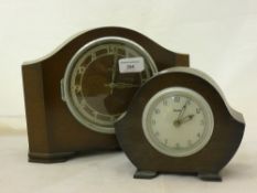 Two electric clocks and a dressing table set