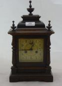 A late 19th/early 20th century walnut mantle clock