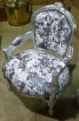 An upholstered child's armchair