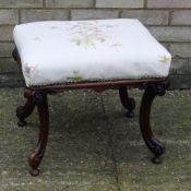 A Victorian walnut stool