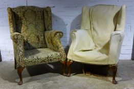 A pair of early 20th century upholstered armchairs