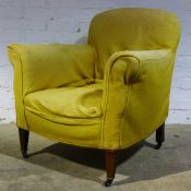 A pair of early 20th century upholstered armchairs