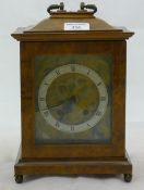 A burr walnut mantle clock